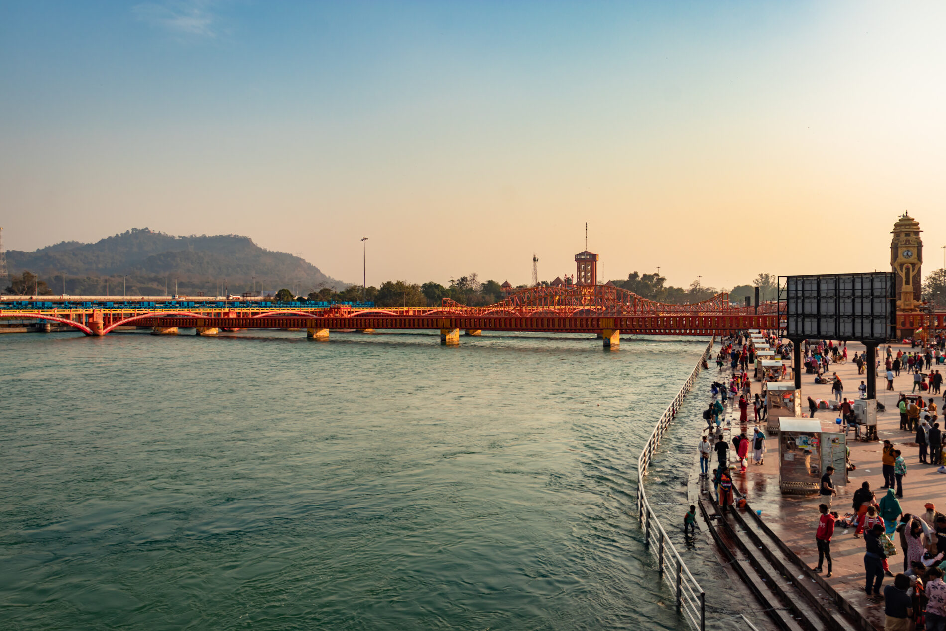 ganges river bank with devotee crowed at evening from flat angle image is taken at har ki pauri haridwar uttrakhand india on Mar 15 2022.